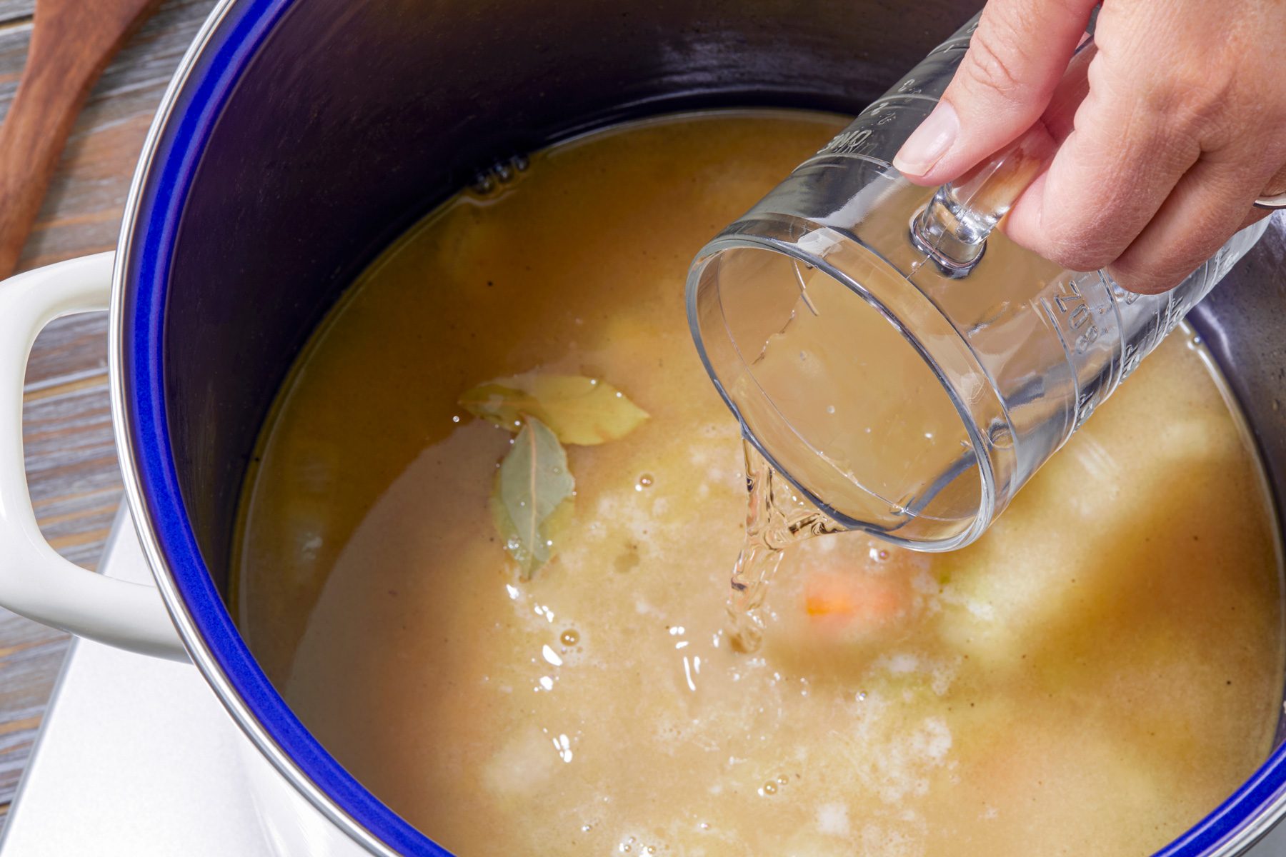 3/4th shot; Gradually added stock and stirring constantly; Stiring in wine; added bay leaves, sugar and peppercorn