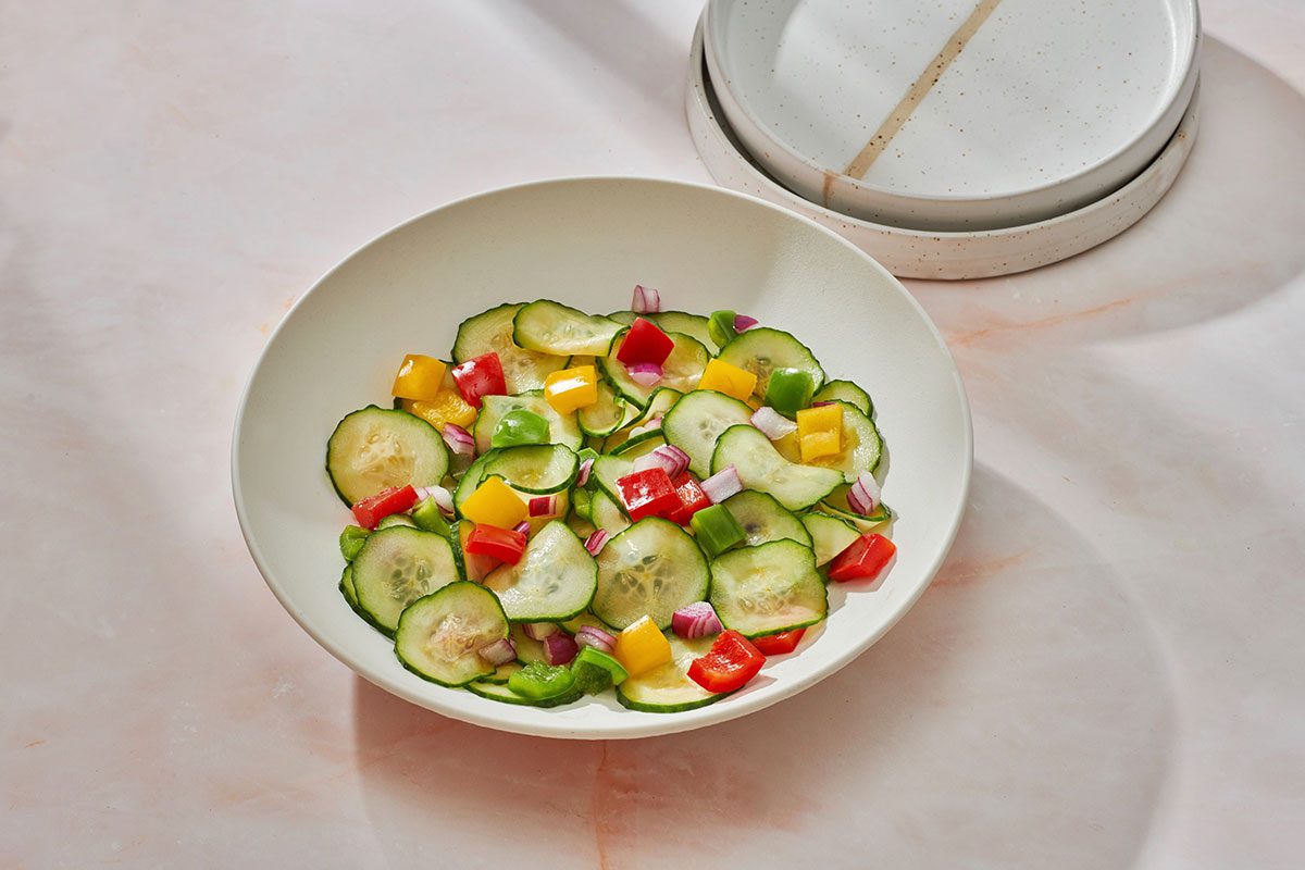 Cucumber Salad with Peppers in a serving bowl