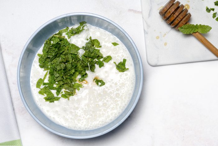 Preparing the yogurt dip for the Fruit dessert