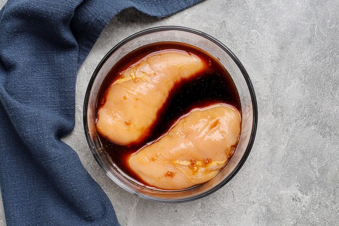 Marinating the chicken for grilled teriyaki chicken.