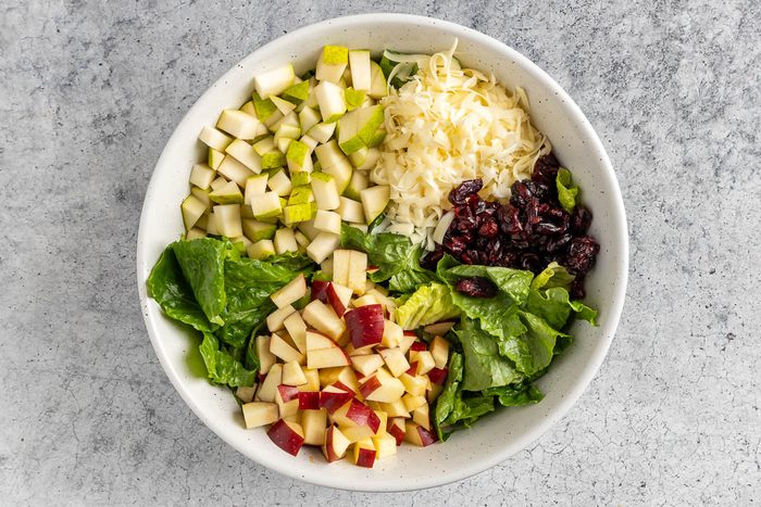 Taste of Home Holiday Salad recipe photo of the salad ingredients in a bowl.