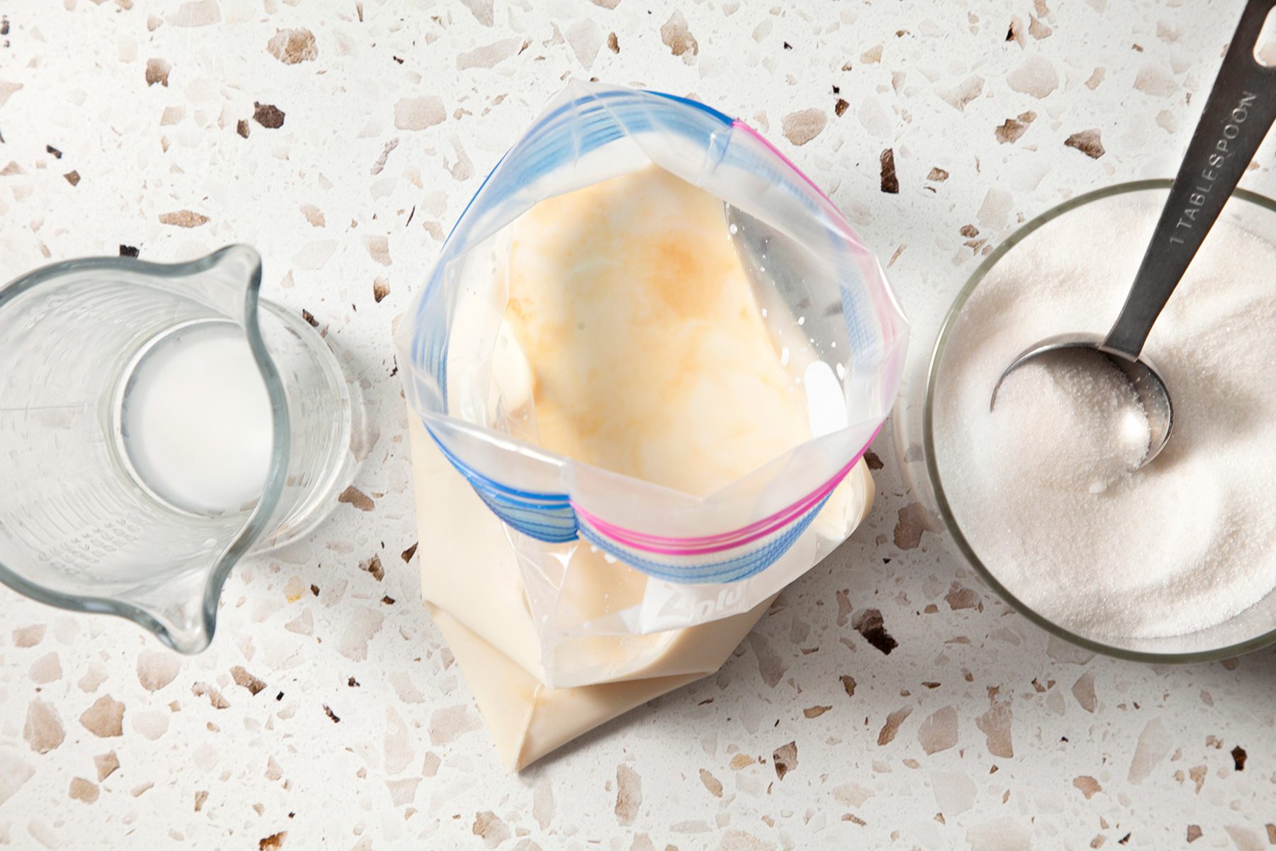 In a small resealable plastic bag, combine the milk, sugar, evaporated milk and vanilla.