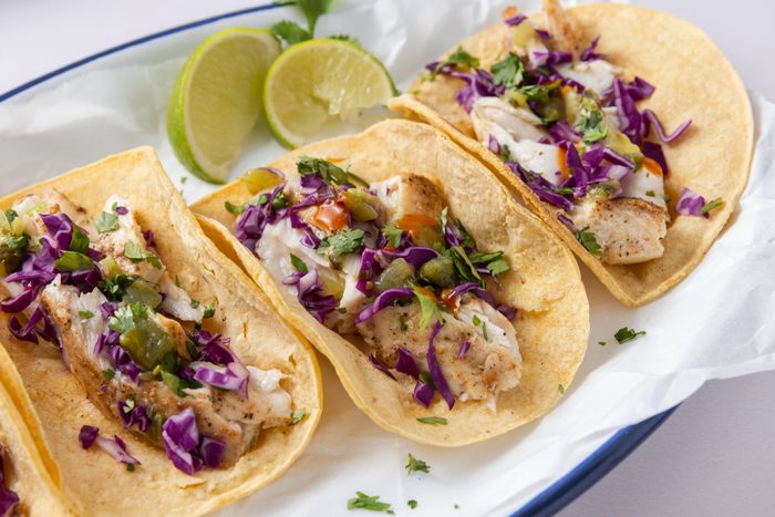Mahi mahi tacos ready, on serving plate.