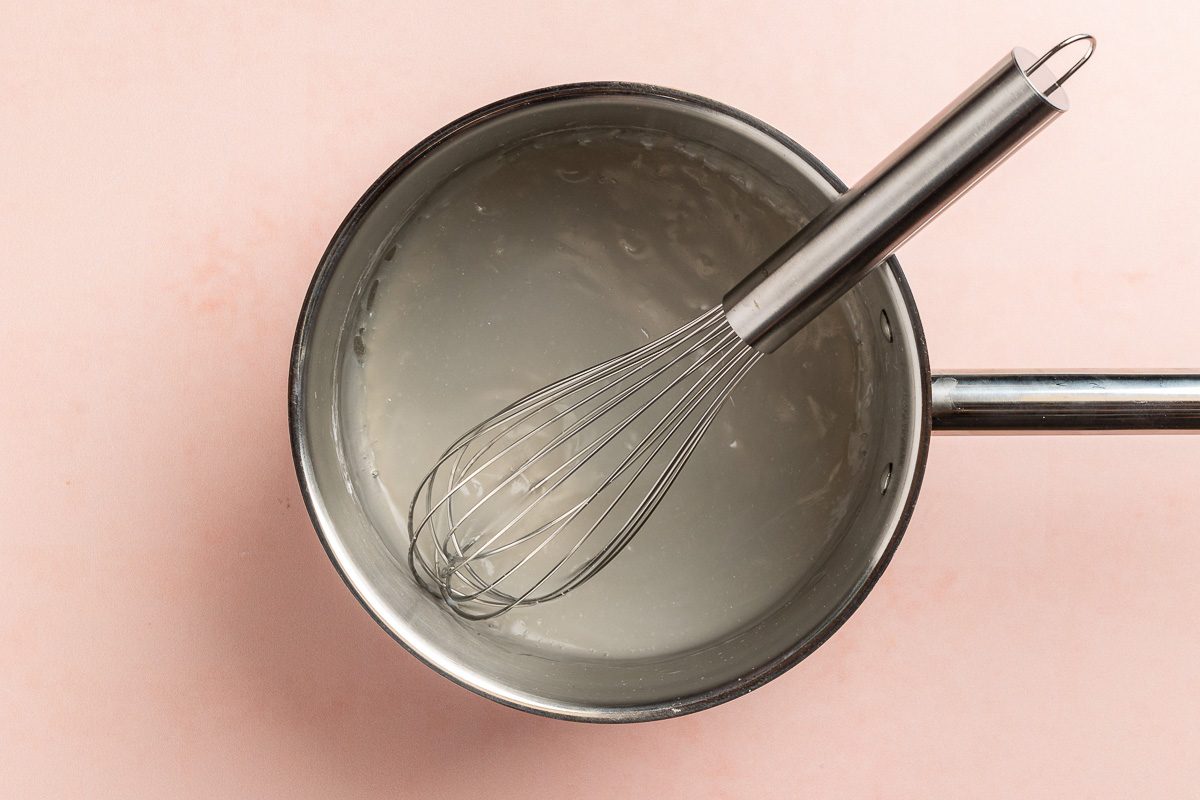 Taste of Home No Bake Blueberry Pie recipe photo of cornstarch, water, and sugar in a saucepan.