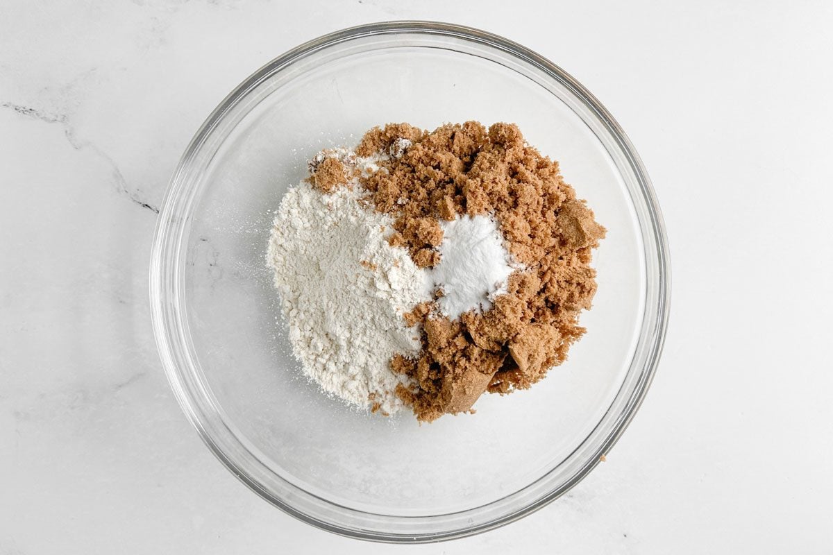 Dry ingredients for Taste of Home Peach Bread in a glass bowl