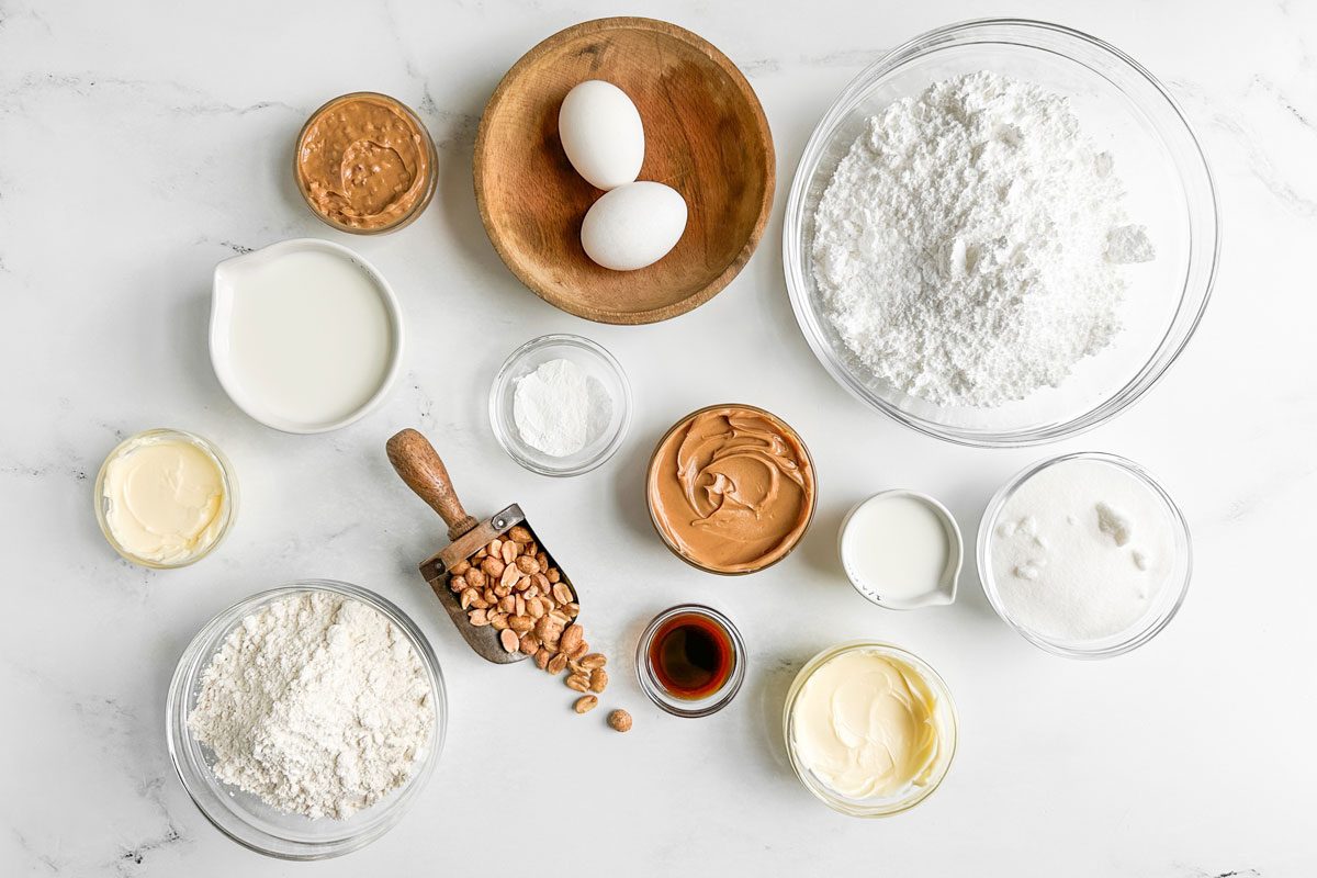 Ingredients for Taste of Home Peanut Butter Cake on a marble surface