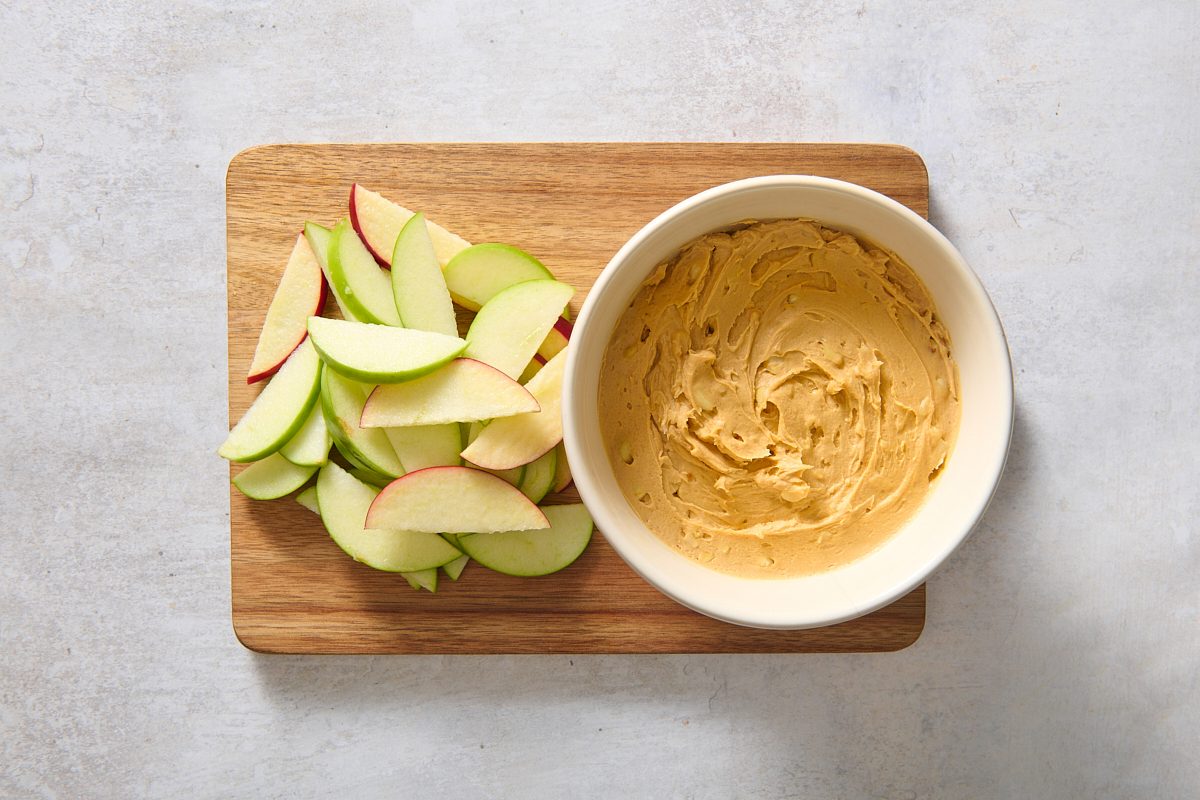 Serving the peanut butter dip with some apple slices