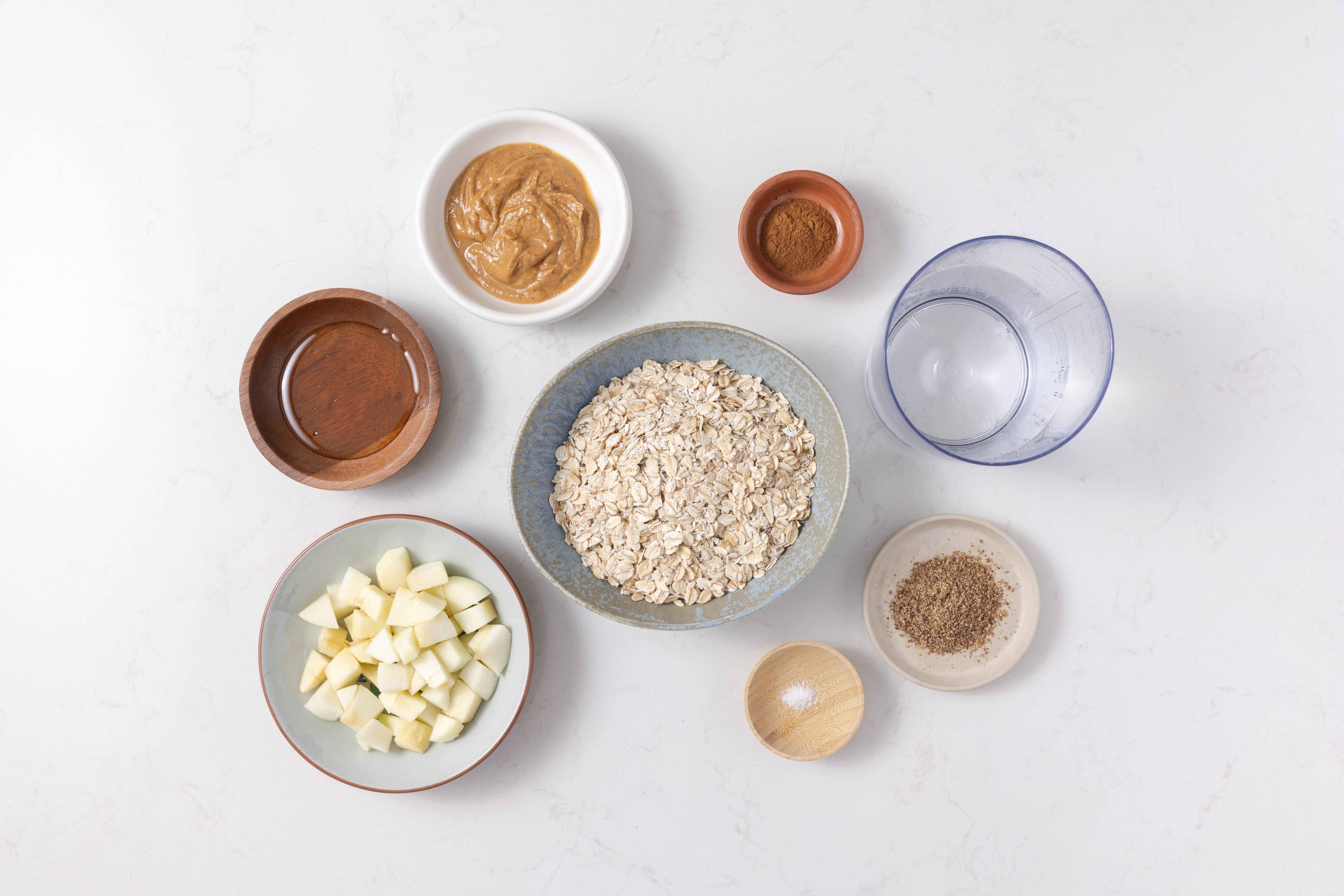 Ingredients for peanut butter oatmeal on kitchen counter.