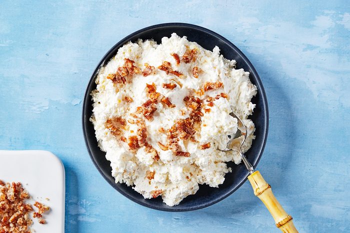 Pineapple Fluff Step 3- adding pretzel crumble to fluff