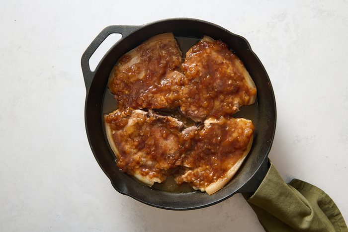 Pork chops after being baked in the oven