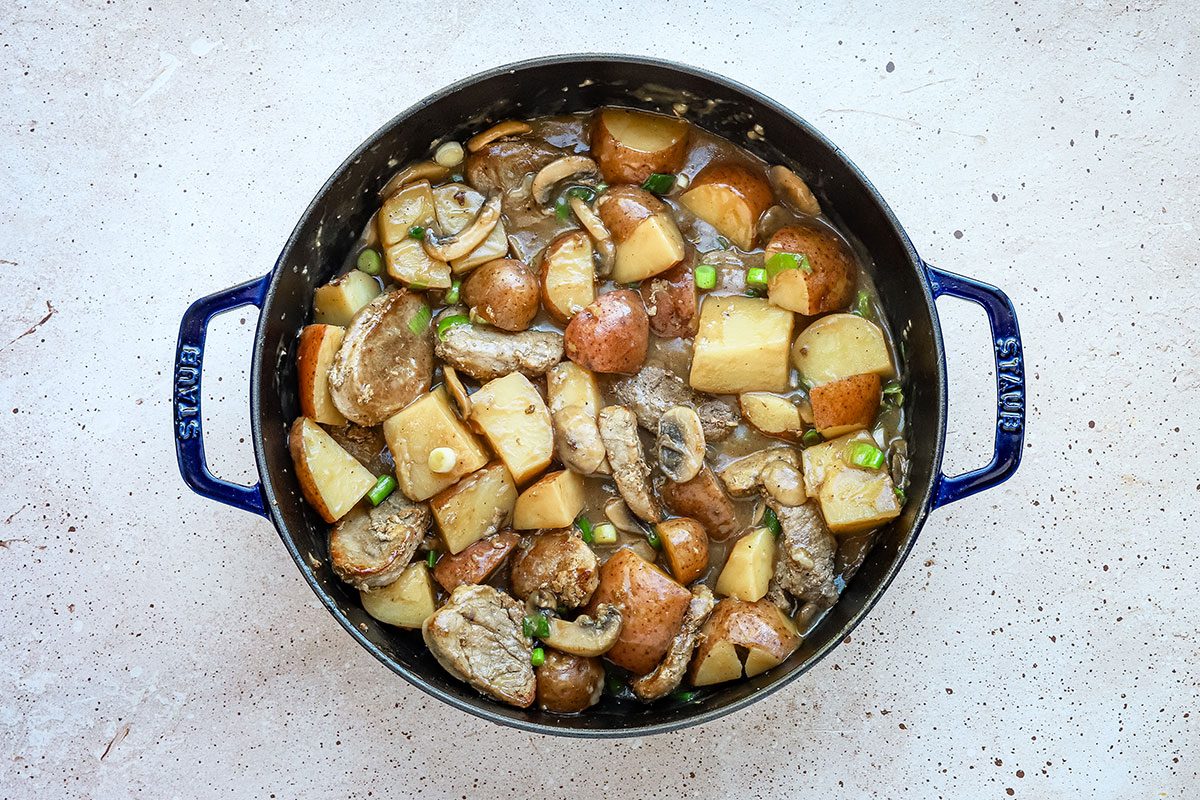 Pork and potatoes in a large skillet, a recipe from Taste of Home.