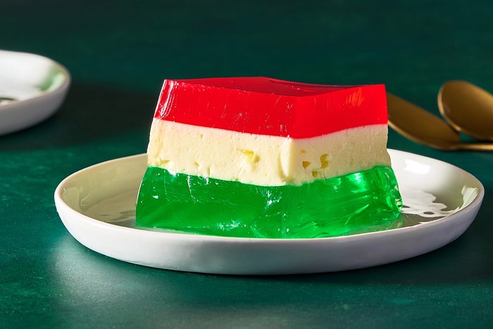 Closeup shot of a square of ribbon jello on a plate