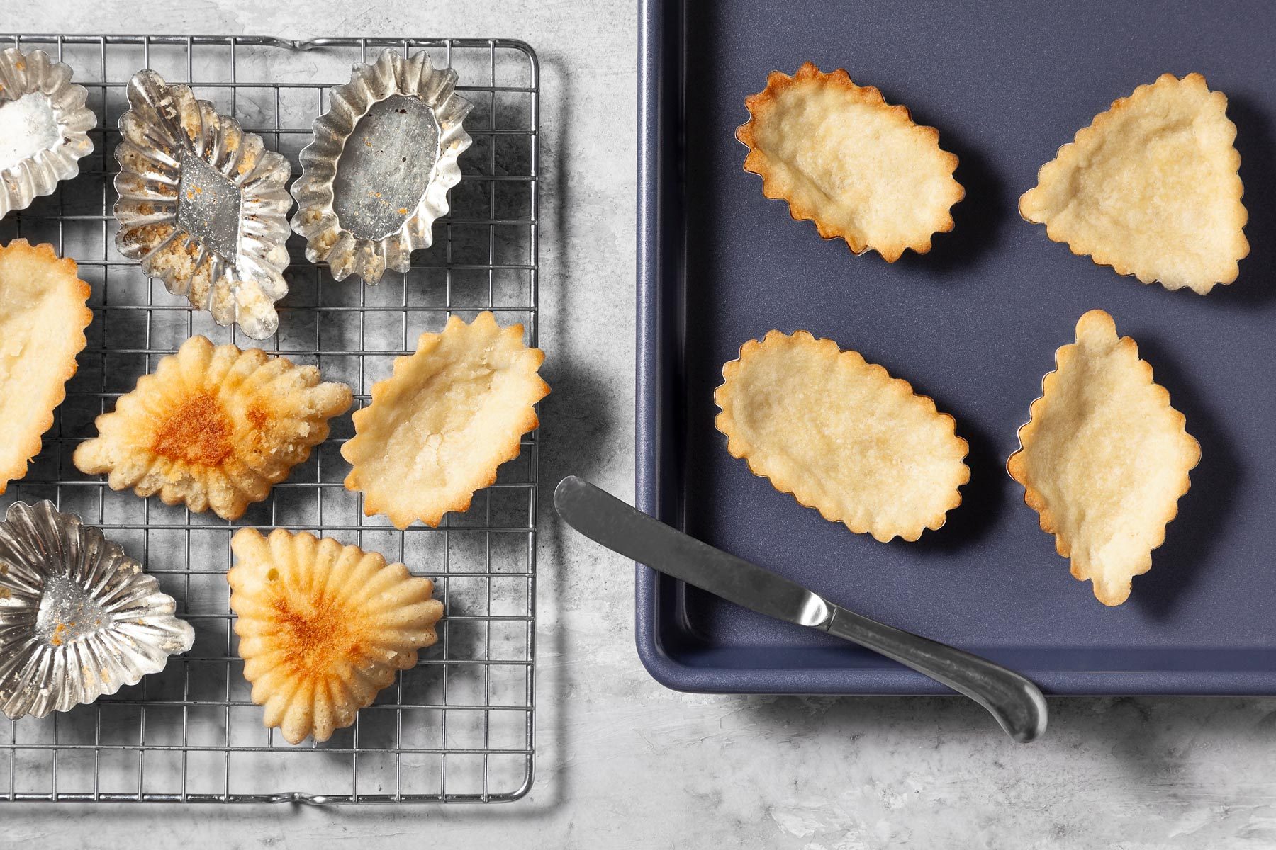 Bake cookies in molds until they appear set and just begin to brown around the edges