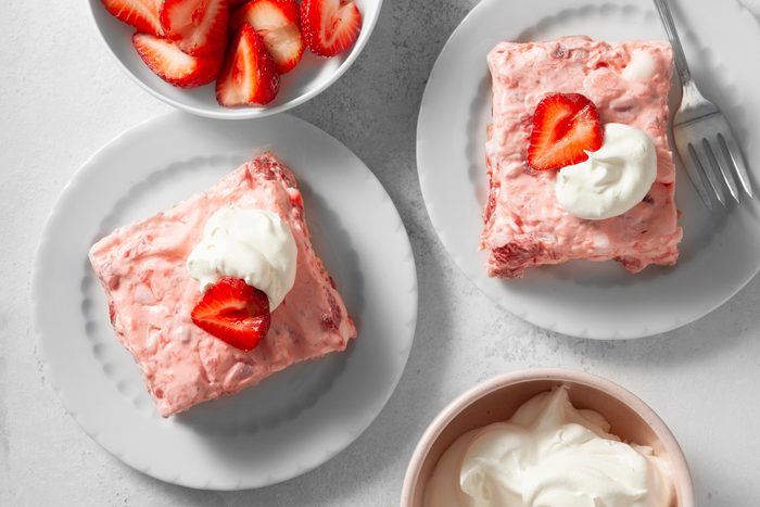 overhead shot of strawberry delight topeed with strawberry and whipped cream