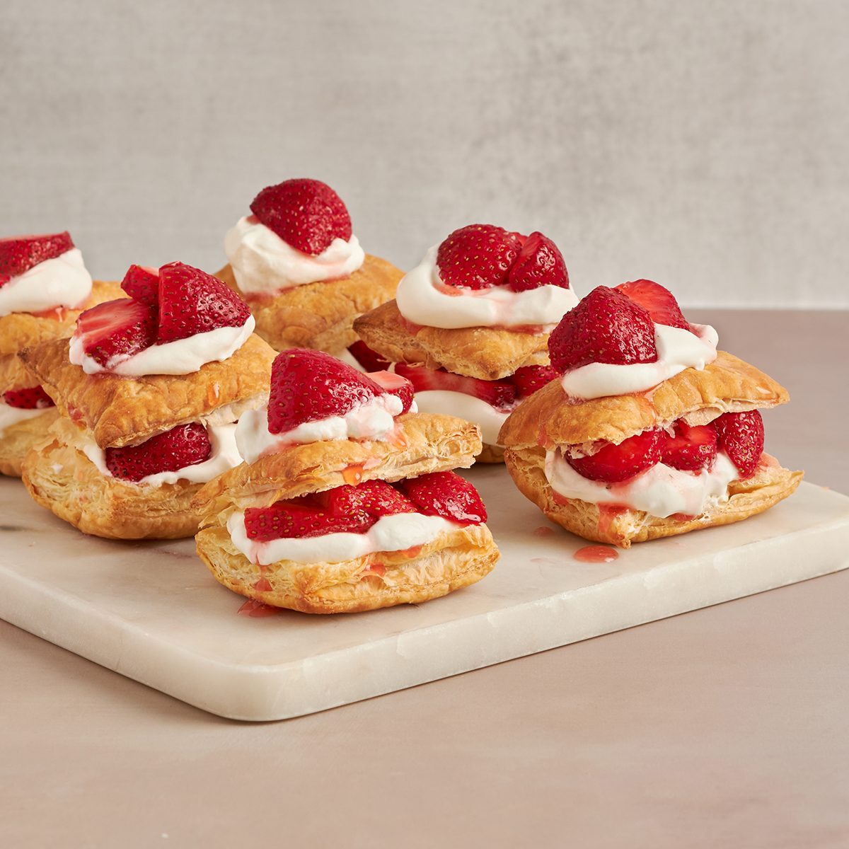 An easy and delicious recipe for strawberry shortcake puffs by Taste of Home.