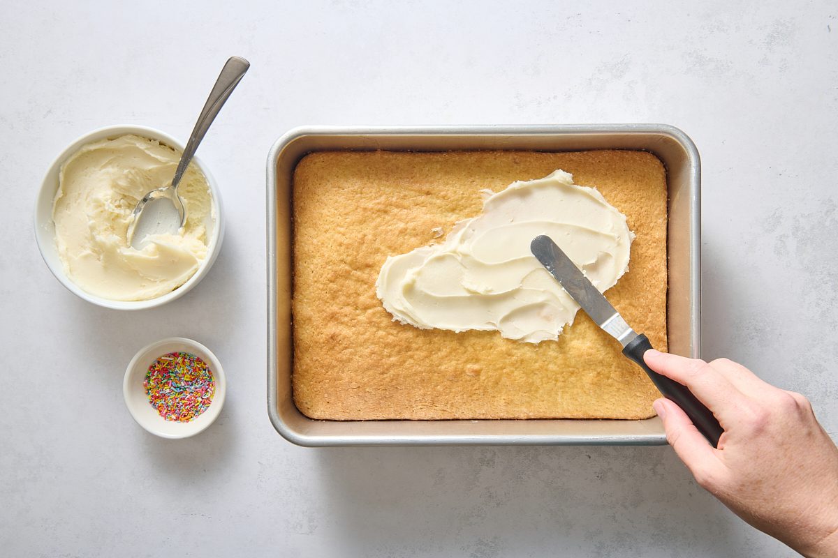 Frosting the baked and cooled cake