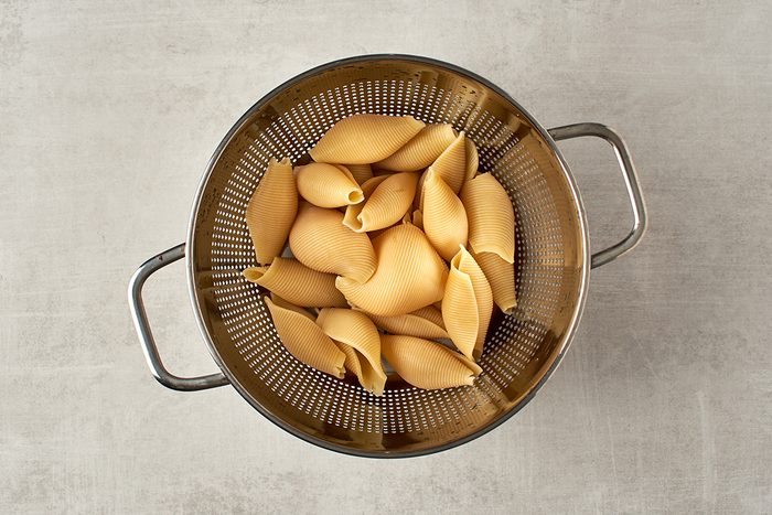Cook pasta shells