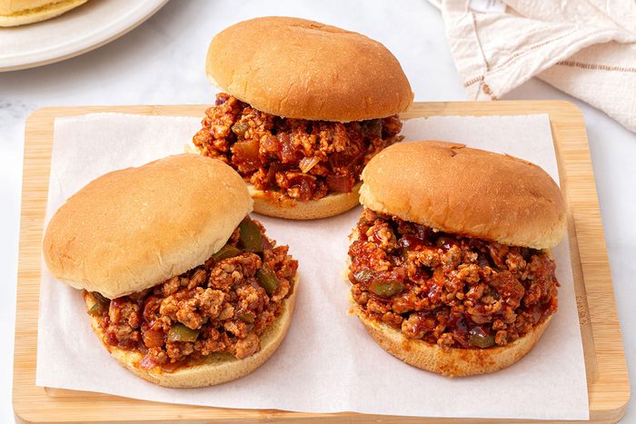 Turkey Sloppy Joes served on a wooden platter