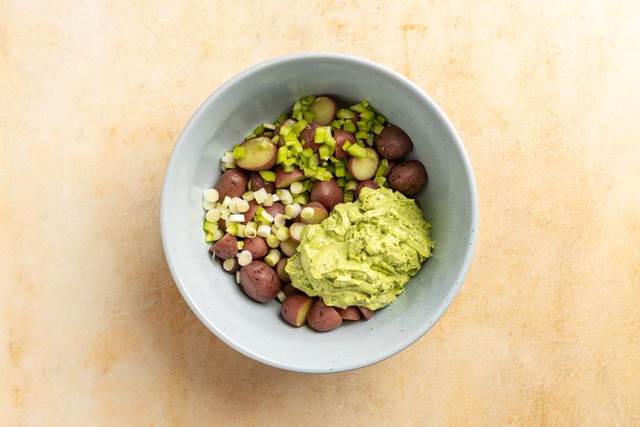 Taste of Home Vegan Potato Salad recipe photo of the prepared dressing in the mixing bowl with the potatoes.