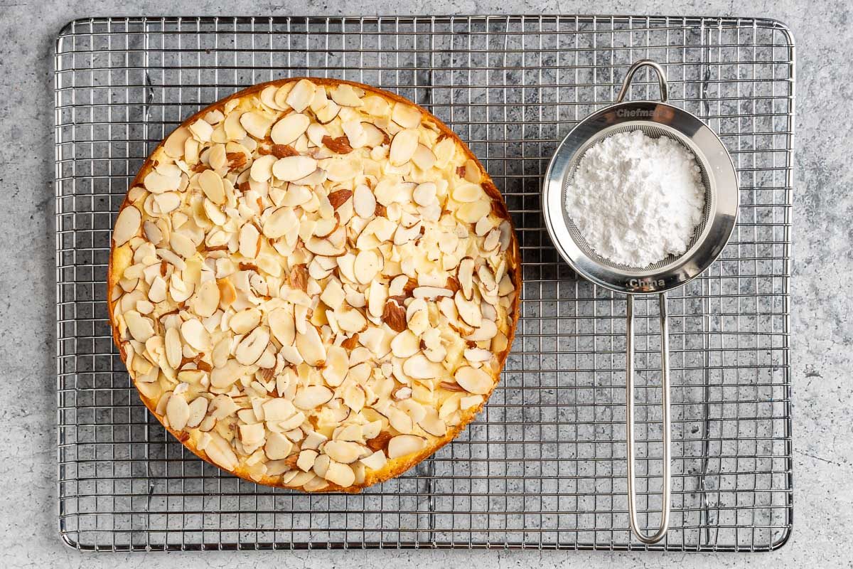 Taste of Home Almond Ricotta Cake photo of the baked caked with confectioners sugar for dusting.
