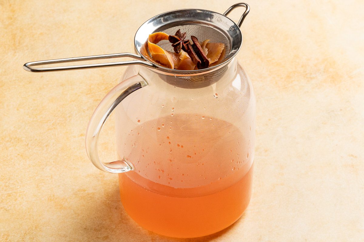 straining the tea.