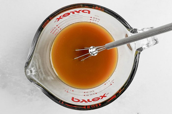 Marinade for Taste of Home Baked Orange Chicken in a pyrex measuring cup