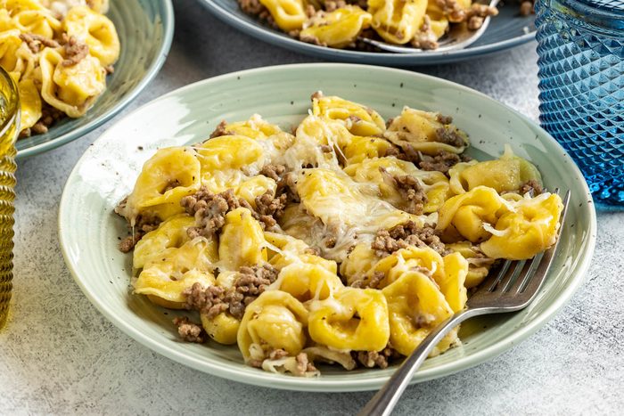 Taste of Home Beef Tortellini photo of the finished recipe served on plates.