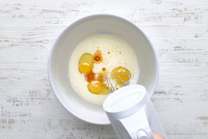 In A Large Bowl, Beat Milk, Eggs, Oil And Vanilla Until Well Blended.