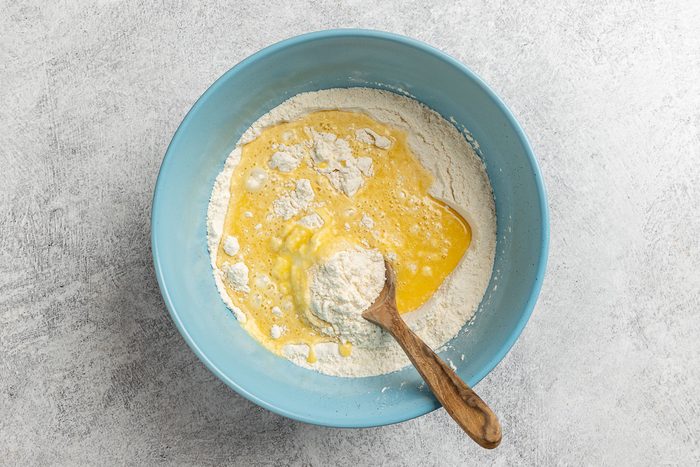 wet and dry ingredients in a mixing bowl.
