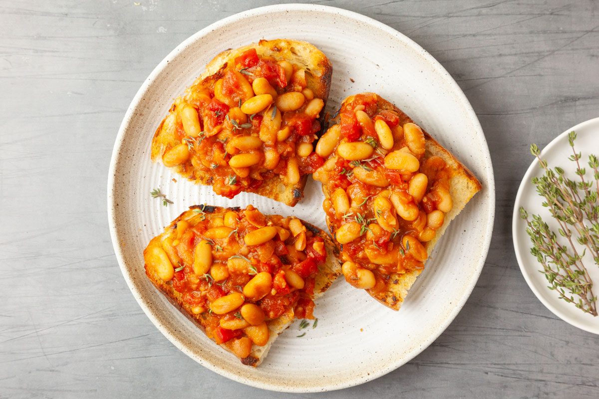 Single servings of Taste of Home British Baked Beans on toasted bread