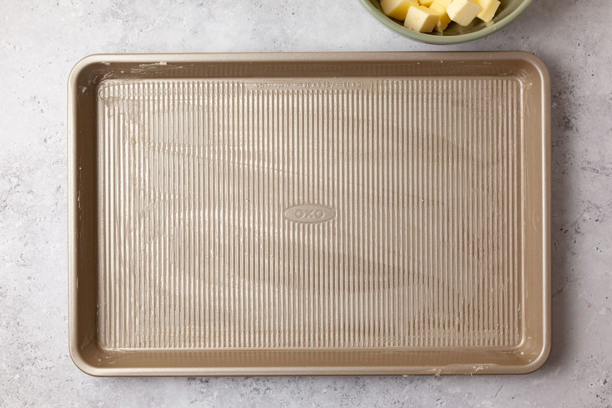 Step 1 of Butterscotch Hard Candy is to butter the pan
