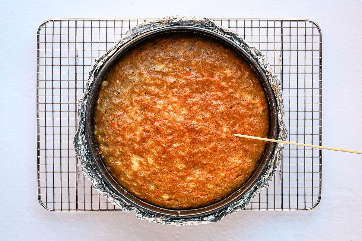 Testing the carrot cake for a carrot cake cheesecake from Taste of Home.