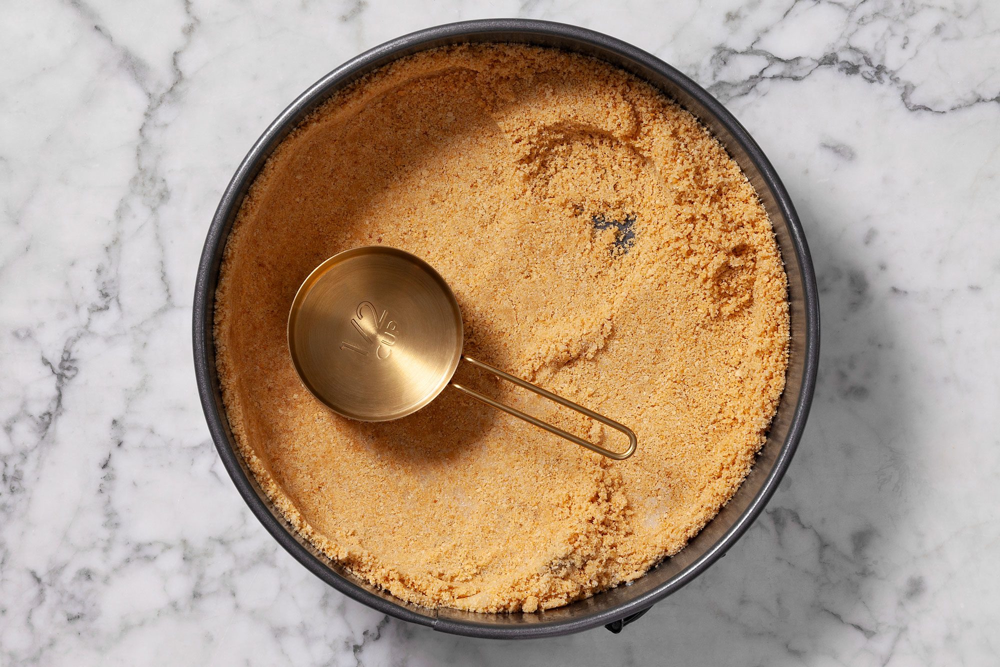 Press the crust evenly onto the bottom and sides of the pan.