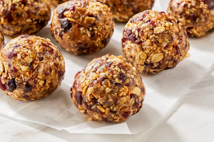 A close-up shot of cranberry almond energy balls, highlighting their texture.