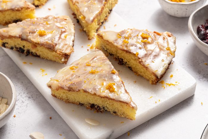 Slices Of Cranberry Orange Cake On Marble Board