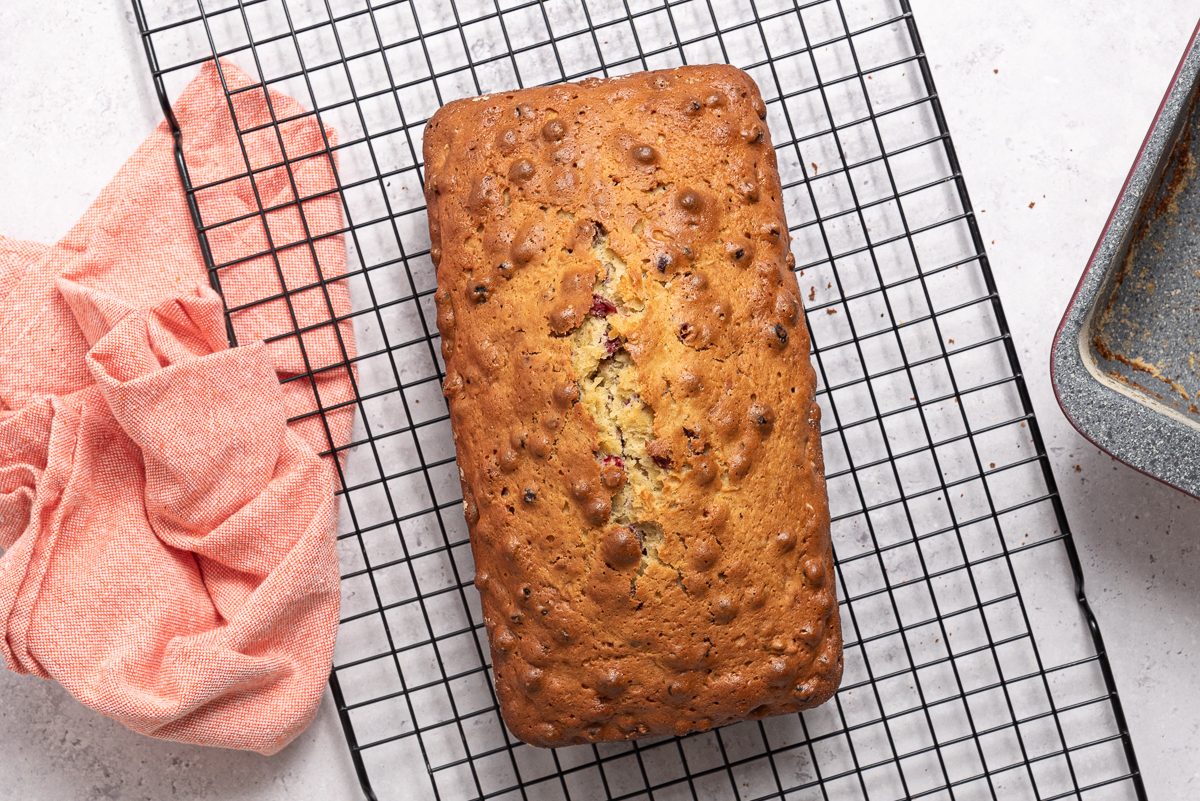 Baked Cranberry Walnut Bread On Cooling Rack