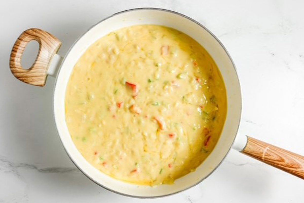 Sauce for Taste of Home Crawfish Fettucine in a white skillet