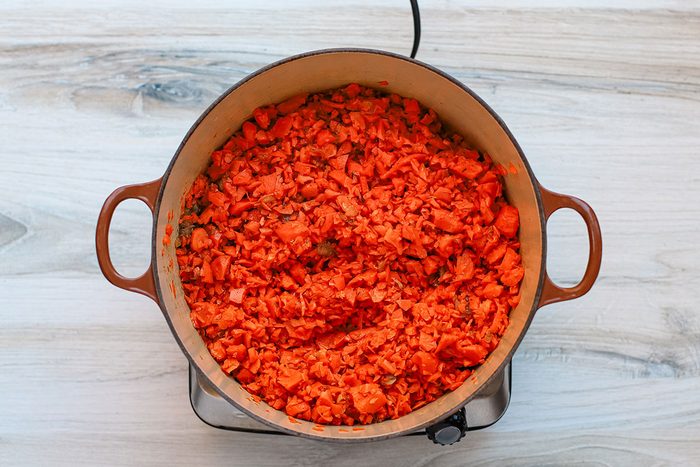 Chopped carrots cooking for carrot soup.