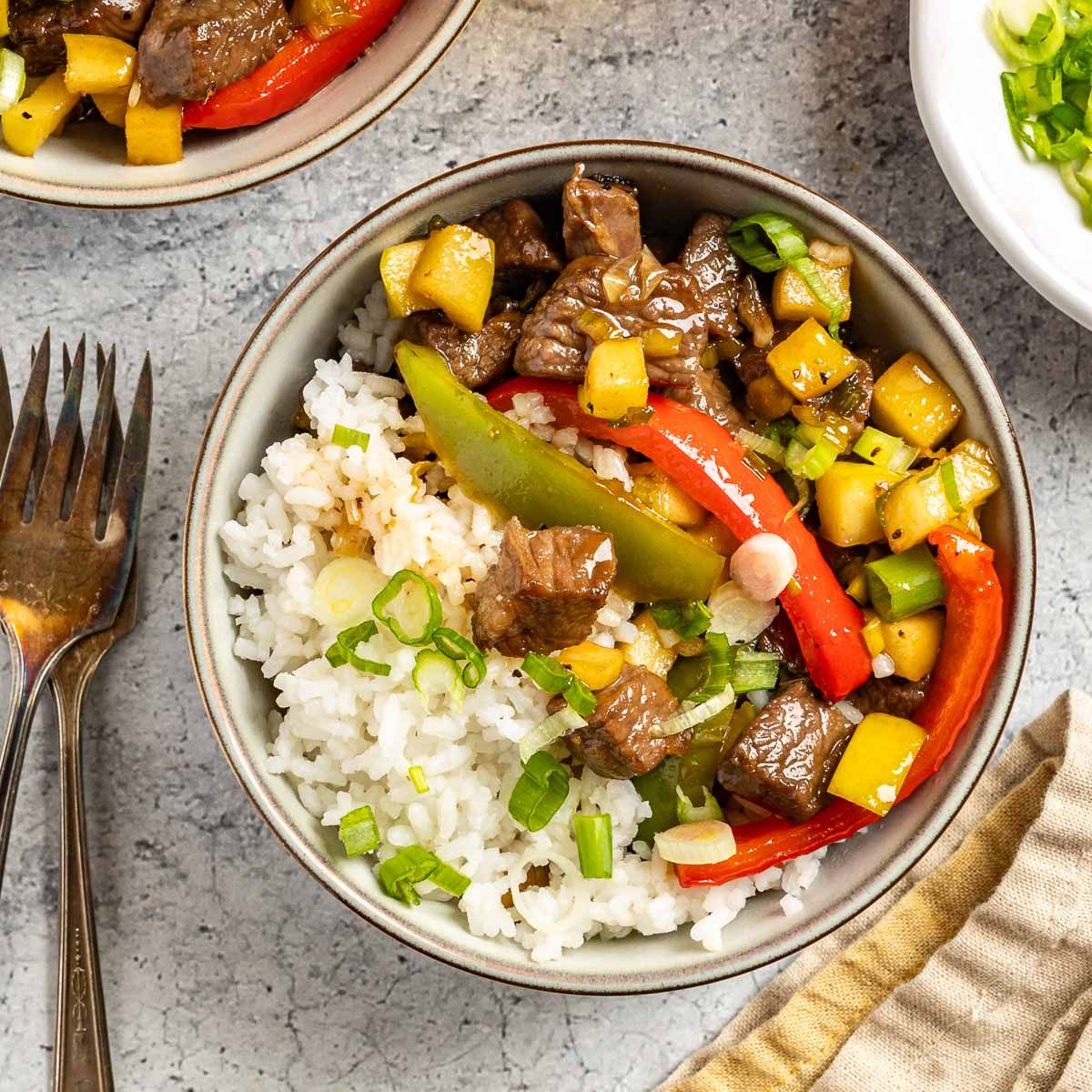 Taste of Home Sweet and Sour Beef photo of the finished recipe served with rice.
