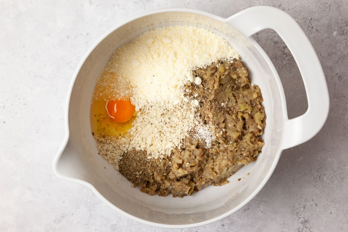Step 3 of Taste of Home Eggplant Parmesan Meatballs is to combine the rest of the meatball ingredients in a bowl