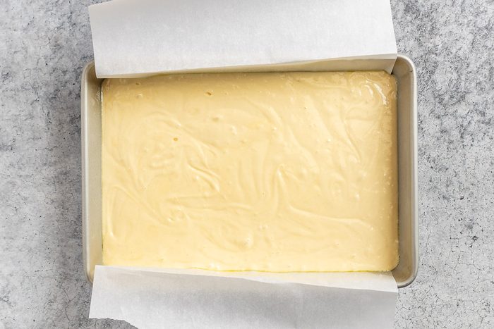 preparing the pan and cake batter.