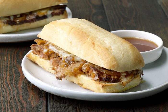 3/4th Shot Of French Dip Sandwiches With Onions