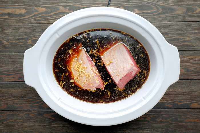 In a large bowl, combine water, soy sauce, soup mix, Cover and cook on low until meat is tender,