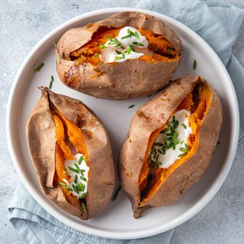 baked sweet potato with cream and chives