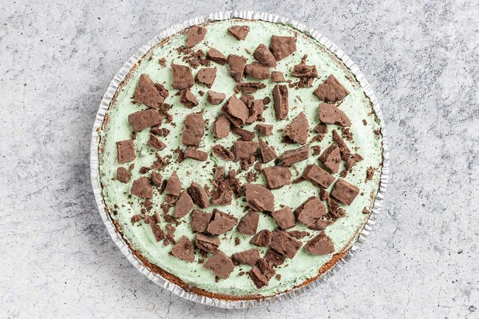 Taste of Home Grasshopper Pie photo of the frozen pie topped with the cookie garnish.