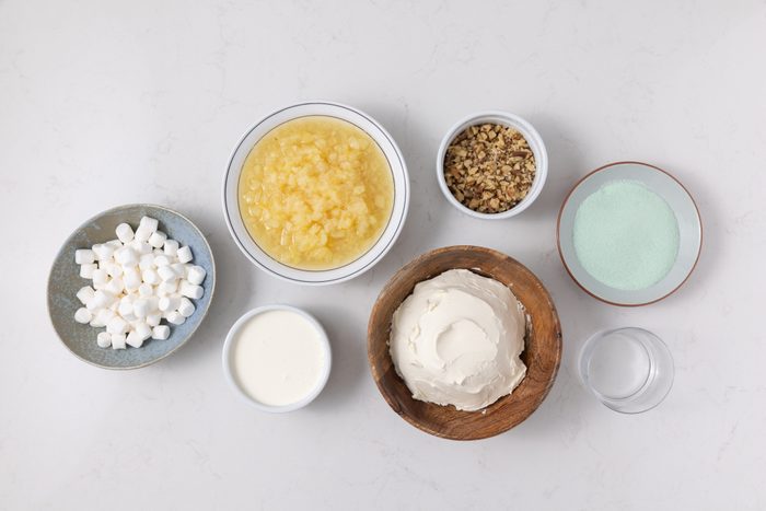 Ingredients for green jell-o salad on kitchen counter.