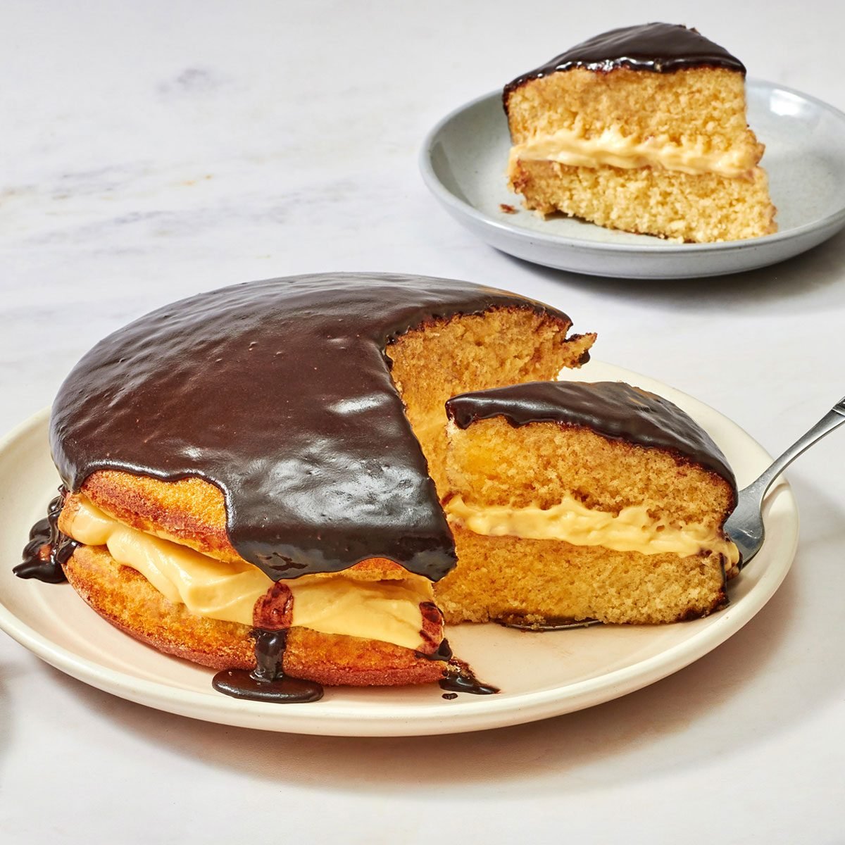 Boston cream pie on a serving plate