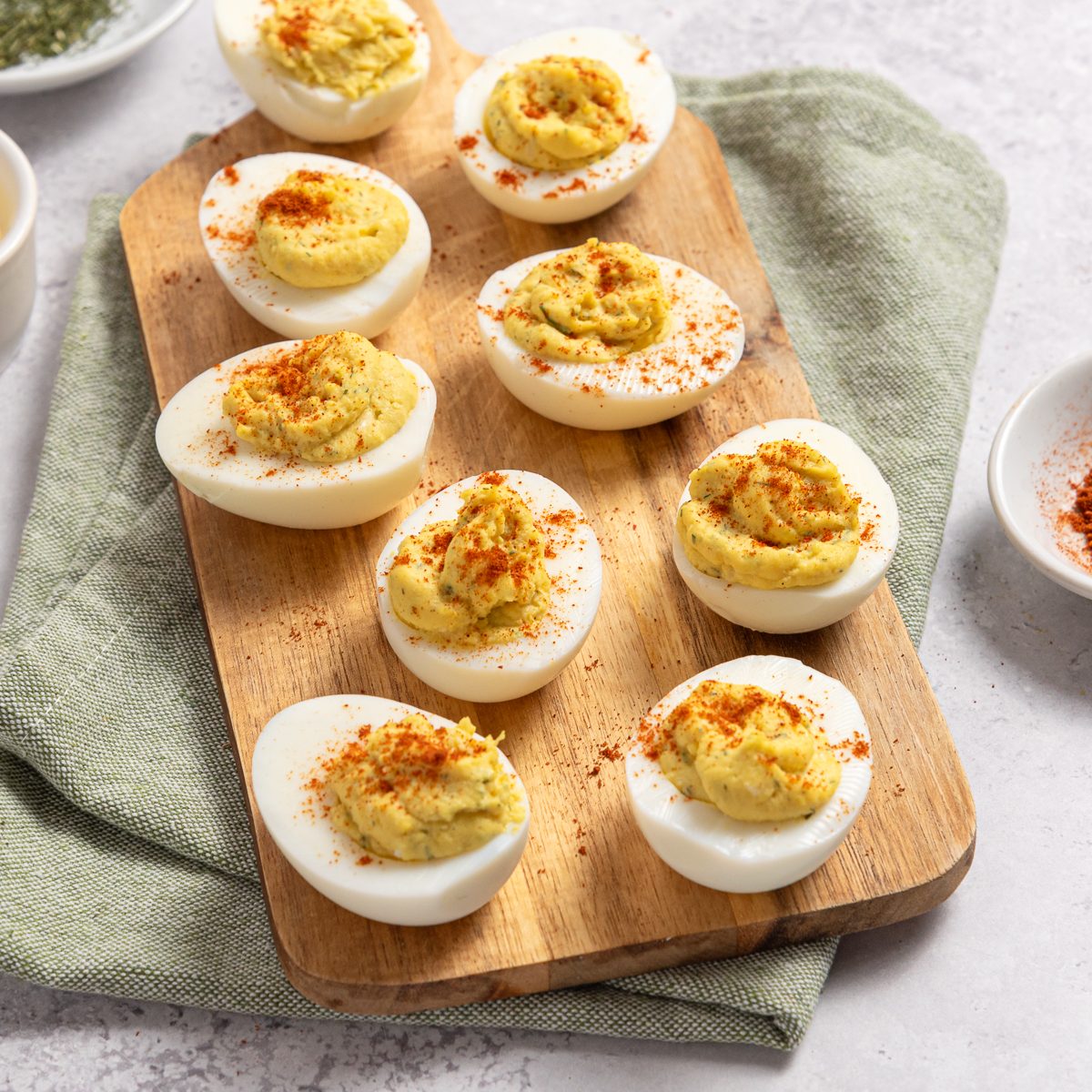 Horseradish Deviled Eggs On Wood Board