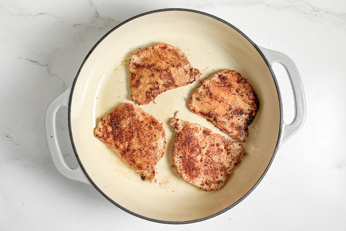 Taste of Home Jamaican Jerk Pork Chops in a ceramic skillet