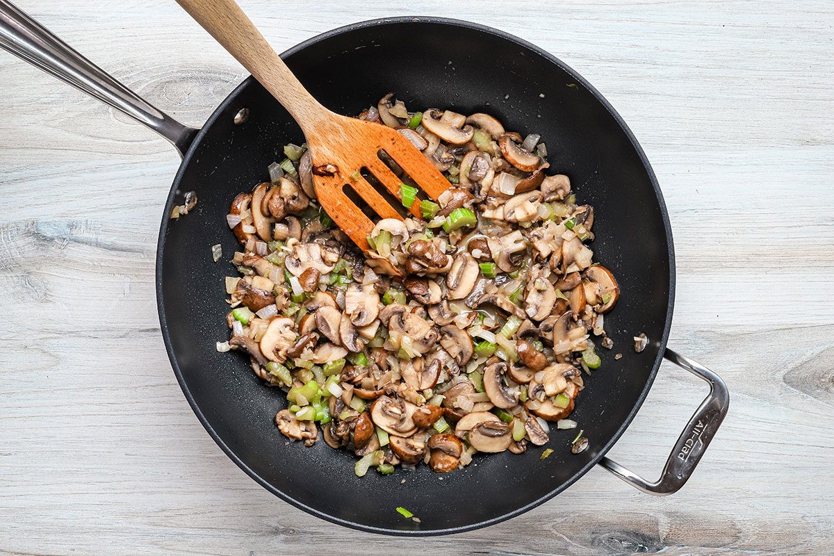 sautéing mushrooms, celery, and onions for keto stuffing, a Taste of Home recipe.